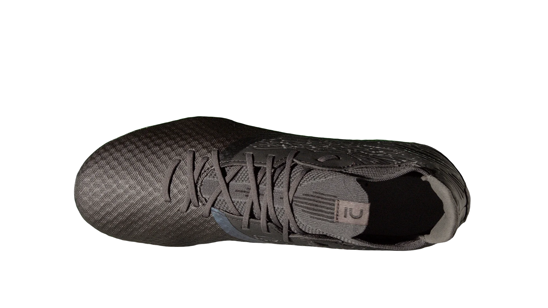 After — The same frame of the FG boot: green background and shooting support, then the isolated product on transparency.