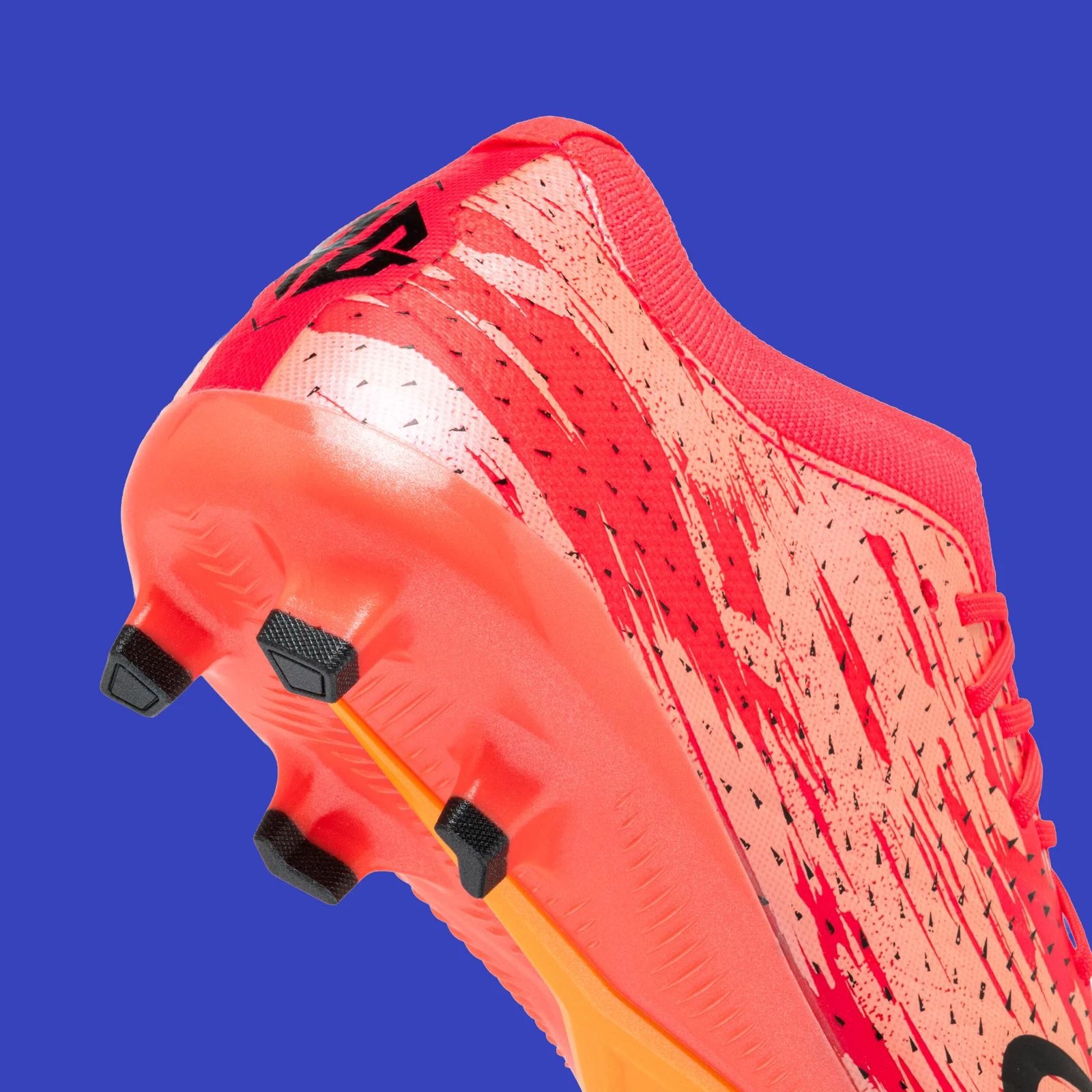 Close-up of the heel and studs on the pink Kipsta CLR Red Storm.