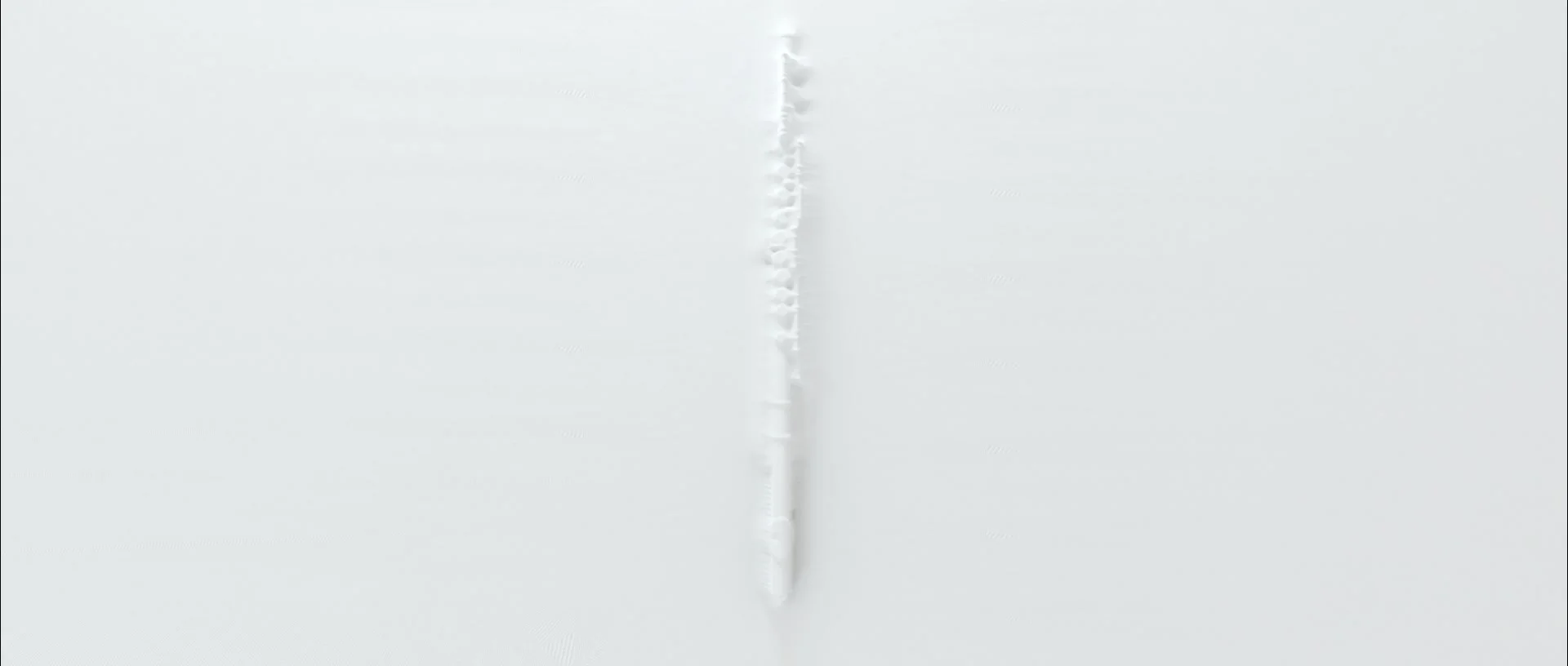 White flute revealed by folds and shadows on the surface.