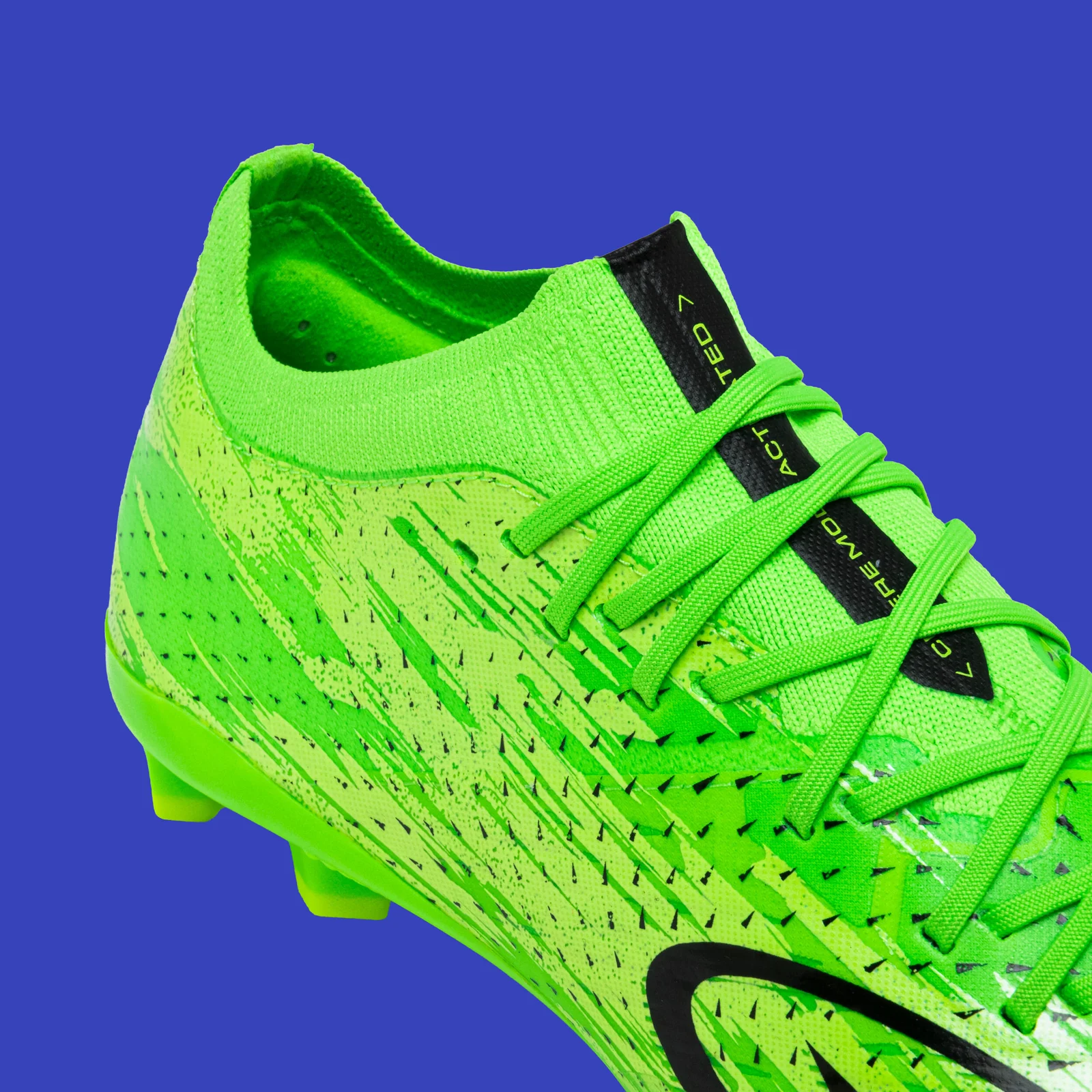 Close-up of the upper and laces on the green Kipsta CLR Green Storm.