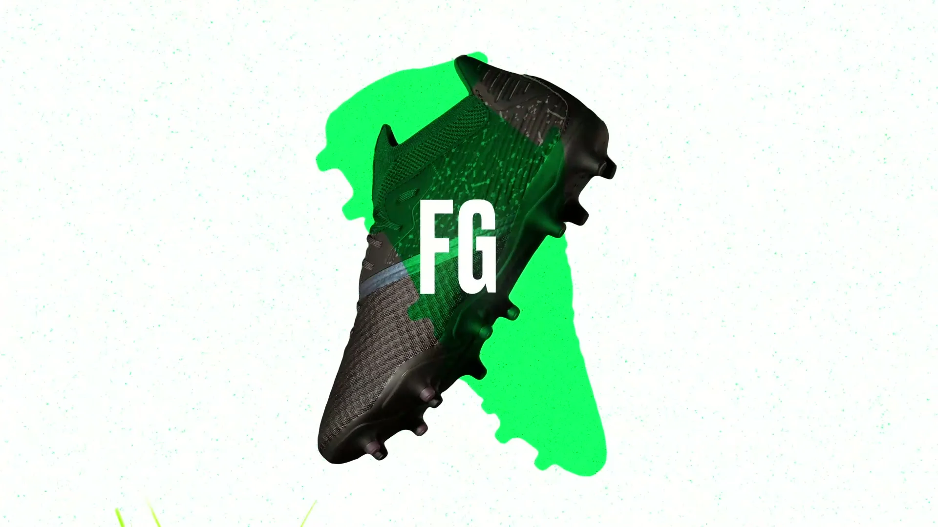 Black Kipsta Firm Ground boot set diagonally against white, in front of a green outsole shape and the letters FG.