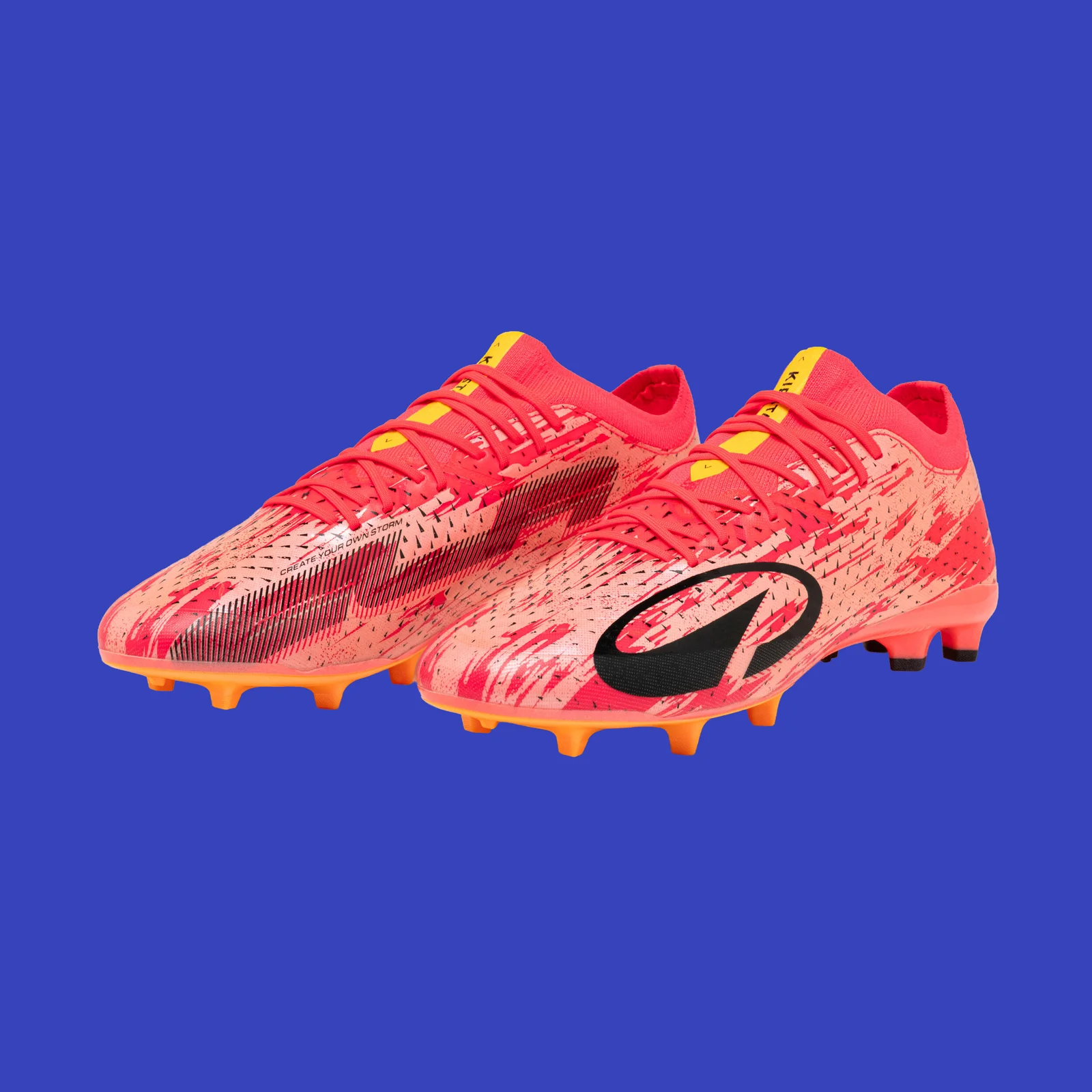 Pink Kipsta CLR Red Storm boots in a three-quarter view.