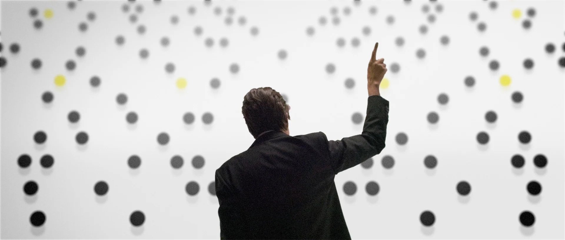 Graphic study: early studies of a crowd made of dots.