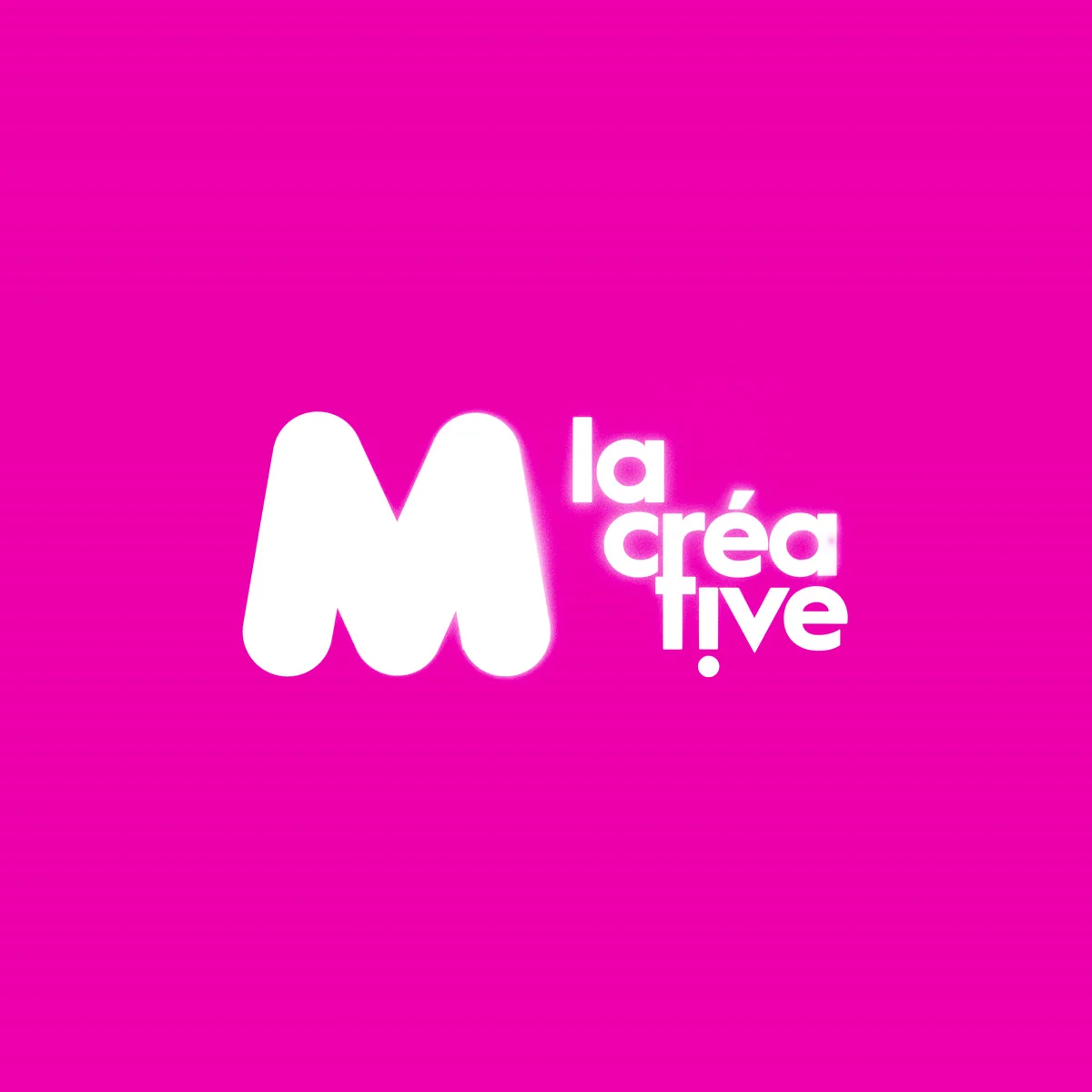 The white M la Créative logo on a pink background.
