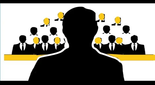 Production storyboard: a rear view of the character facing black and yellow figures.