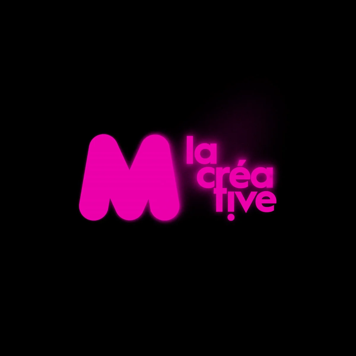 The M la Créative logo: pink on black.